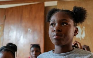 ‘Do not give up on children’: Displaced by violence, a Haitian girl finds hope at school
