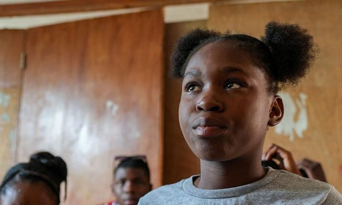 ‘Do not give up on children’: Displaced by violence, a Haitian girl finds hope at school